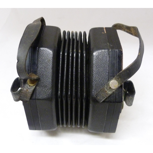 339 - C Wheatstone & Co, LondonSixty-four button concertina, c. 1920, no. 35155, with pierced nickel p... 