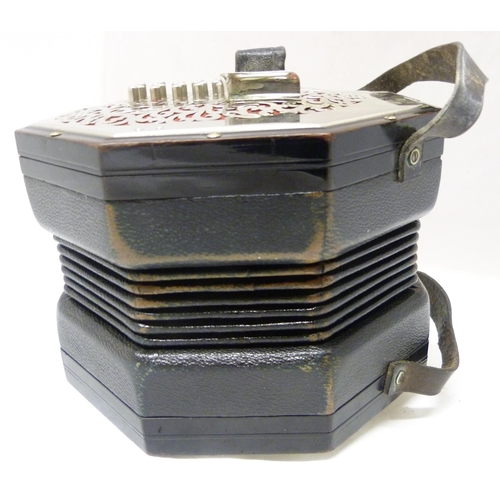 339 - C Wheatstone & Co, LondonSixty-four button concertina, c. 1920, no. 35155, with pierced nickel p... 