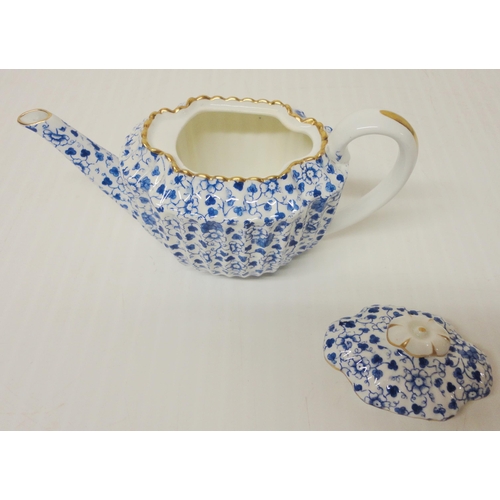 308 - Copeland Spode 'Blue Chintz' porcelain cabaret set comprising a teapot, sugar and cream, two cups an... 