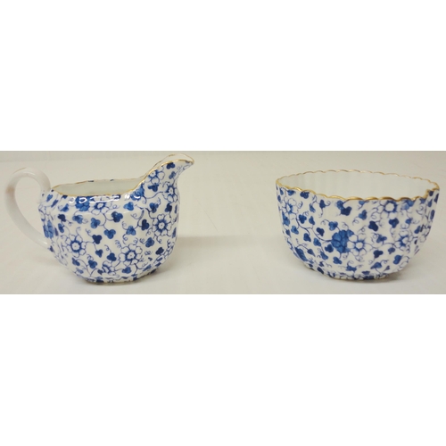 308 - Copeland Spode 'Blue Chintz' porcelain cabaret set comprising a teapot, sugar and cream, two cups an... 