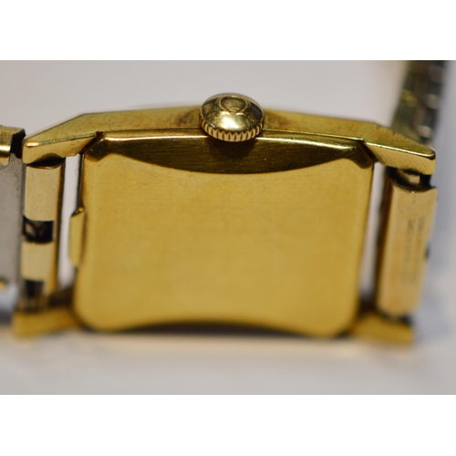 275 - Omega 18ct gold lady's watch, rectangular case, no. 3982, on rolled gold bracelet.