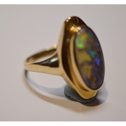 146 - Black opal ring in stepped 9ct gold setting, size M, 4.7g gross.