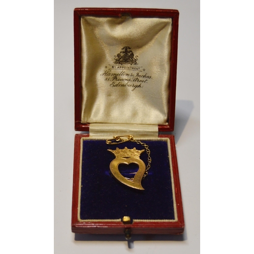 156 - Gold brooch of luckenbooth style, 'Holyrood 1918', probably 15ct, with attached 9ct safety chain, ca... 