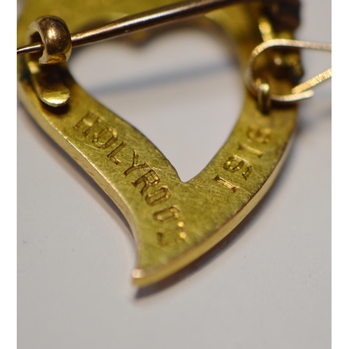 156 - Gold brooch of luckenbooth style, 'Holyrood 1918', probably 15ct, with attached 9ct safety chain, ca... 