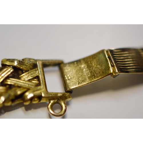 279 - Rotary 9ct gold ladies watch, 1960, on chevron bracelet, 19.6g gross.