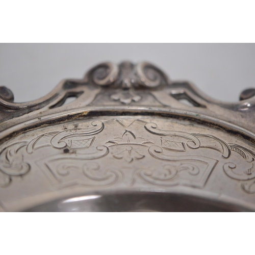 118 - Victorian silver shaped card tray, with pierced scroll border and engraved reserves below, by Henry ... 