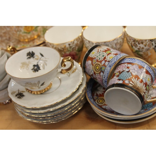 135 - Tea and coffee ware to include Royal Tron fine bone china coffee set, a Windsor bone china teaset, a... 