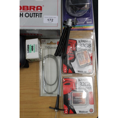172 - Camera accessories to include two Yongnuo speed lghts, a Cobra flash outlet, memory cards, camera ba... 