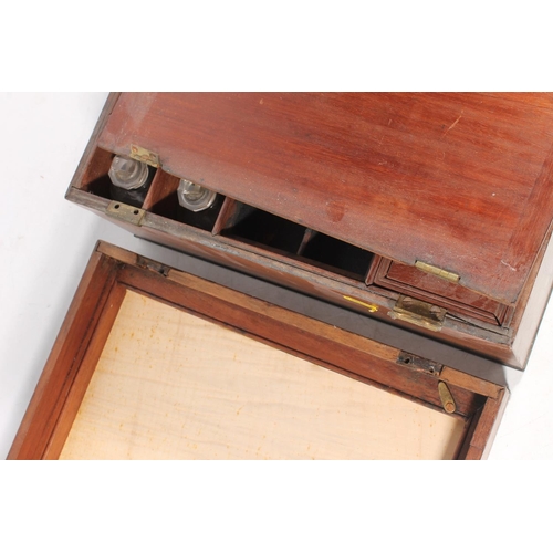 22 - Antique mahogany hinge top travelling box, the interior with fitted lift up boxes and compartments, ... 