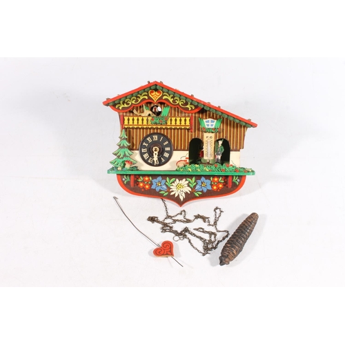 28 - Swiss cuckoo clock modelled as a chalet, 24cm long.