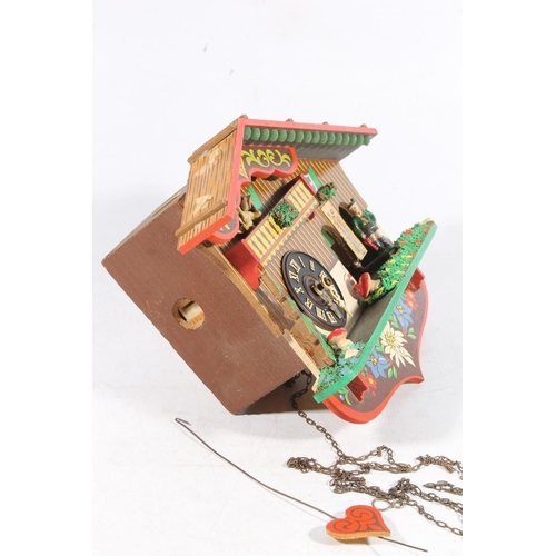 28 - Swiss cuckoo clock modelled as a chalet, 24cm long.