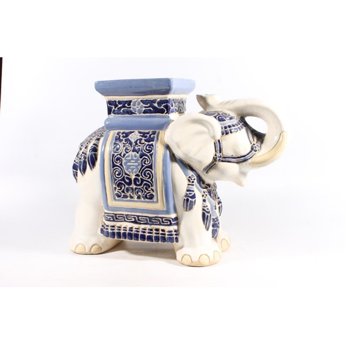 32 - Ceramic jardinière stand in the form of an elephant, 44cm high.