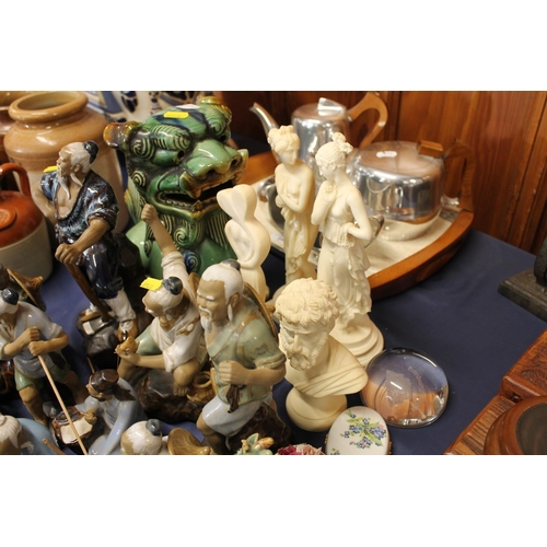 35 - Chinese pottery foo dog, oriental 'Mud Men' pottery models of fishermen, etc., a paperweight, a trin... 