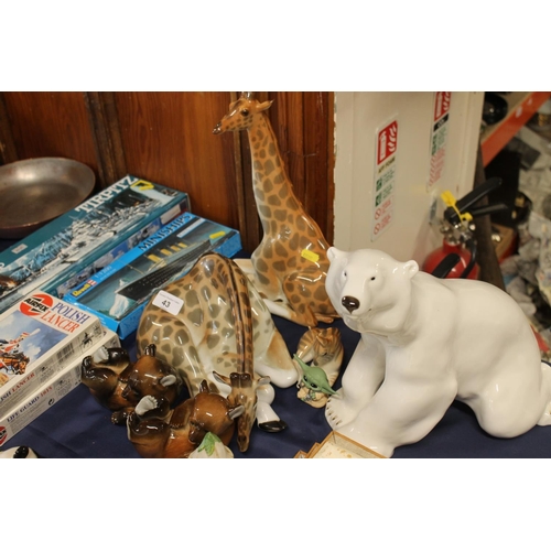 43 - USSR porcelain animal models to include giraffes, a polar bear, etc.