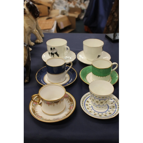 48 - Macher of Glasgow English bone china coffee can and saucer, another by Coalport, and four others.