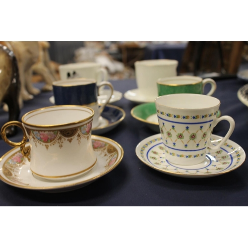 48 - Macher of Glasgow English bone china coffee can and saucer, another by Coalport, and four others.