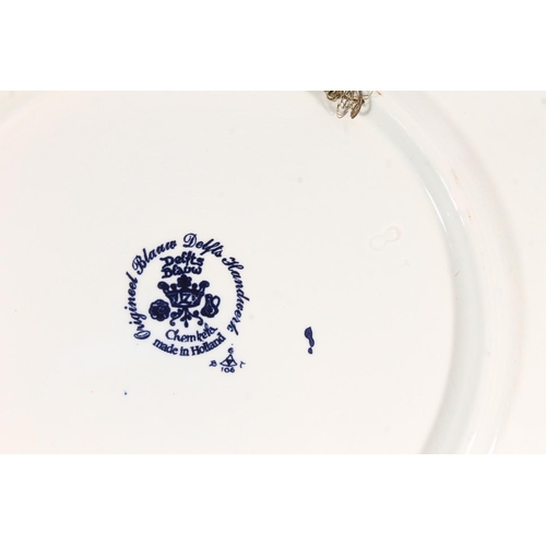 51 - Chemketa of Holland Delft blue and white charger dish, decorated with nativity scene, 34cm diameter.