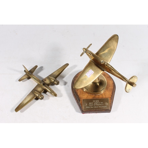 52 - Brass desktop paperweight in the form of a spitfire, and another.