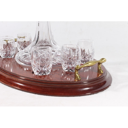 54 - Waterford Crystal cut-glass whisky set on stand with ship's style decanter and six barrel shaped sho... 