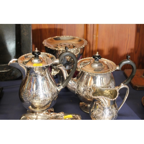 6 - Silver-plated ware to include a three piece teaset, a warming stand, a cheese dish and cover, etc.