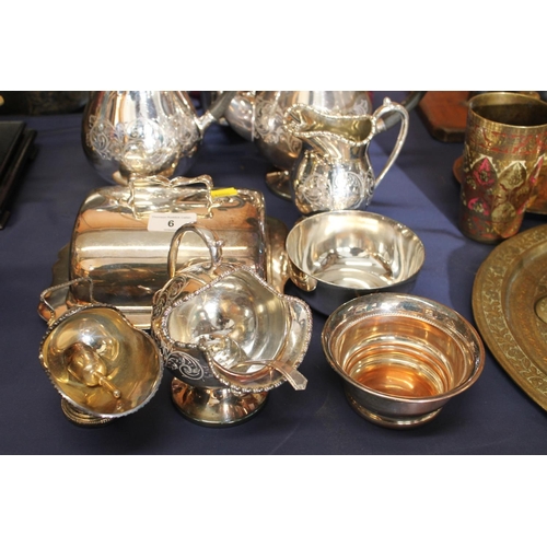 6 - Silver-plated ware to include a three piece teaset, a warming stand, a cheese dish and cover, etc.