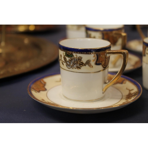 9 - Noritake gilt and floral decorated part coffee set.