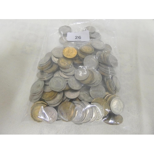 26 - Bag of various British coins to include shillings, sixpence etc.