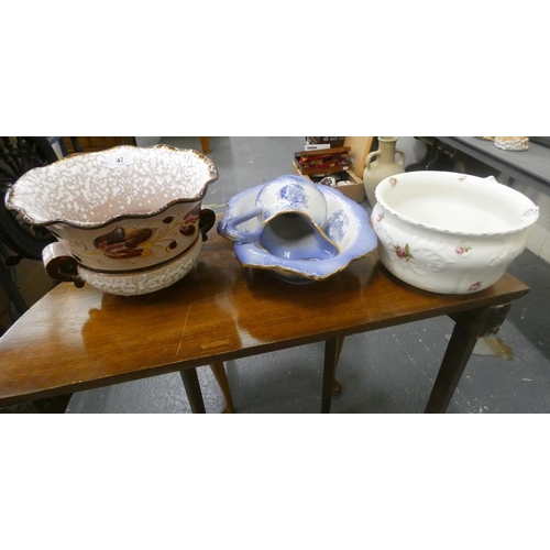 47 - Blue and white chamber set, a floral decorated chamber pot and a twin handled jardinière.