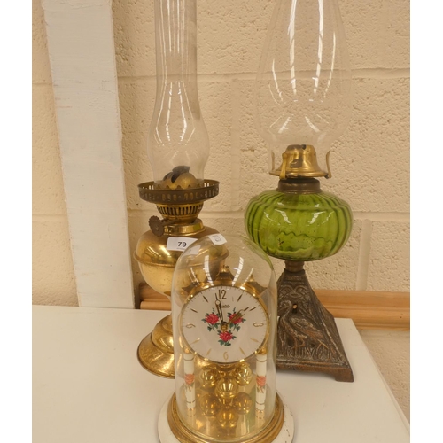 79 - Two large oil lamps and anniversary clock.