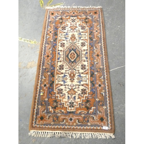 83 - Small Eastern style rug.