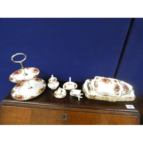 96 - Royal Albert Country Rose cake stand, sandwich plates and four miniature items.