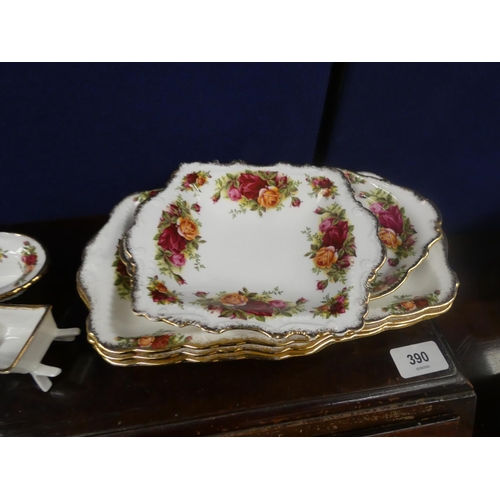 96 - Royal Albert Country Rose cake stand, sandwich plates and four miniature items.