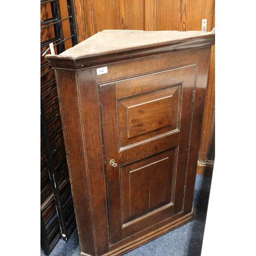 766 - Oak corner cupboard.