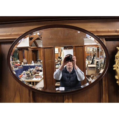 773 - Oval wall mirror, 80cm wide.