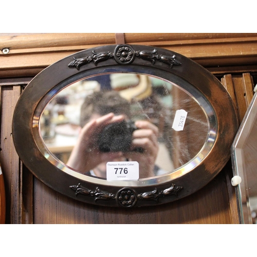 776 - Metal framed wall mirror, 27cm wide.