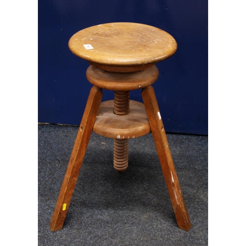 780 - Adjustable oak stool.