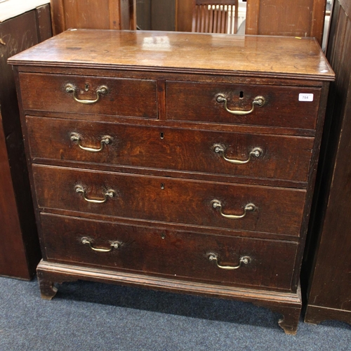 784 - Edwardian oak chest of two short over three long drawers.