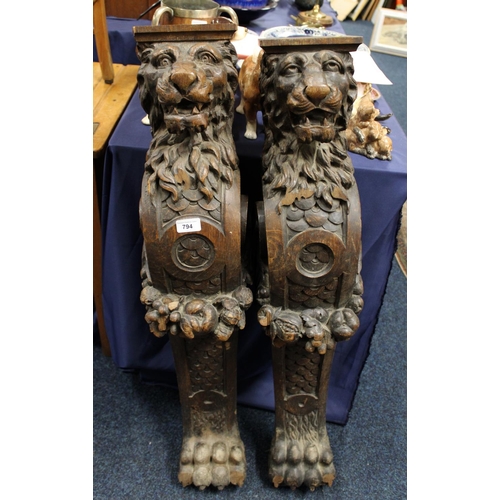 794 - Pair of antique lion carved corbels/sconces, 101cm high.