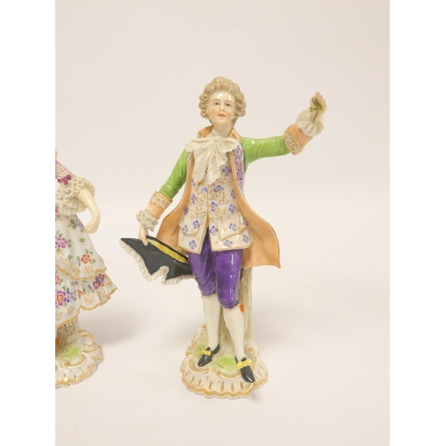 169 - Pair of Naples figures in 18th century dress, he waving and holding his hat, she holding a flower al... 