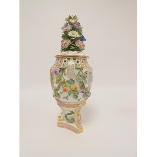 173 - Potschappel baluster urn and cover, the cover with piled high naturalistic flowers above reticulated... 