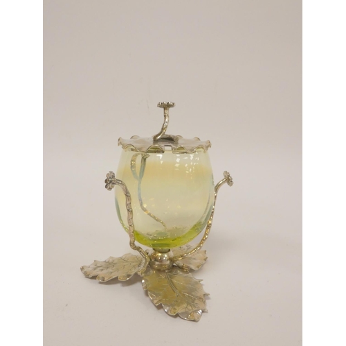 177 - Vaseline glass preserve pot of ovoid form on naturalistic leaf and branch mounts; also another prese... 