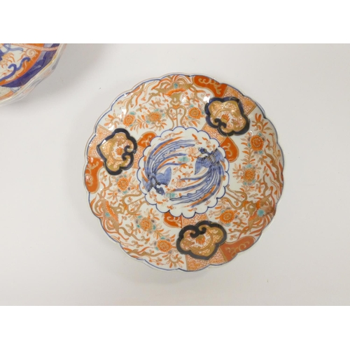 218 - Pair of 19th century Imari plates of lobed form decorated in typical palette with blue and gilt exot... 