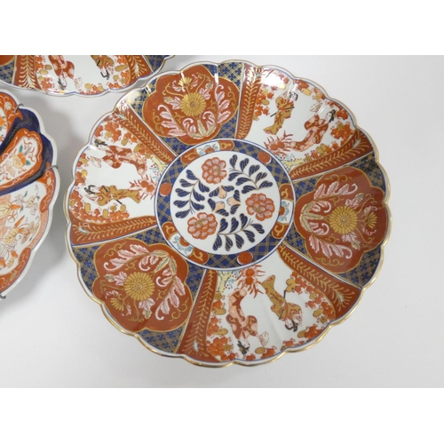 219 - 19th century Imari charger of lobed form decorated in panels in typical palette, 37cm diameter; also... 