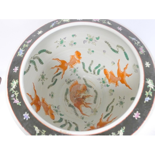 222 - Early 20th century Chinese famille noir fish bowl, the interior painted with carp and pond foliage, ... 