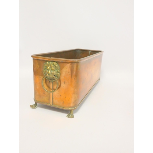 277 - Victorian copper kettle; a copper rectangular planter with mask ring handles and claw feet and a pie... 