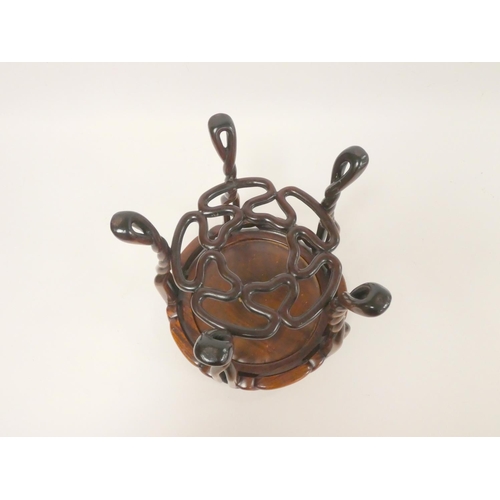 265 - Chinese vase stand of circular bentwood and scroll form, 27cm diameter, 25cm high.