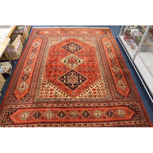 803 - Persian rust red and cream ground carpet, 360cm x 275cm.