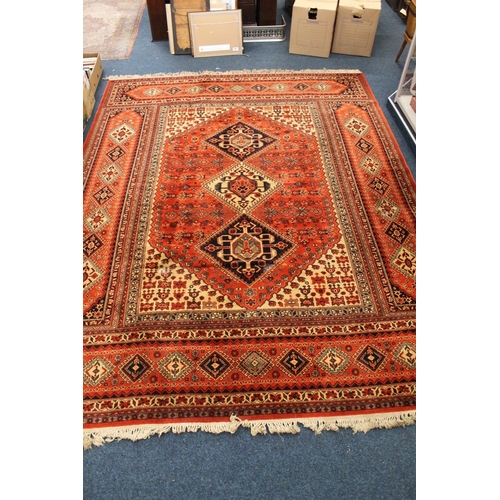 803 - Persian rust red and cream ground carpet, 360cm x 275cm.