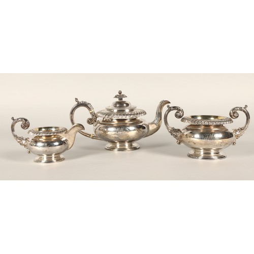 155 - George III silver three piece tea service, consisting of teapot, sugar and cream, assay marked Sheff... 