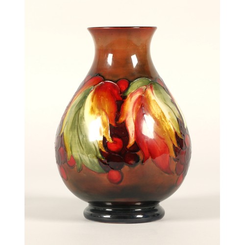 3 - Moorcroft pottery flambe vase in the leaf and berries pattern, impressed marks and signed to the bas... 